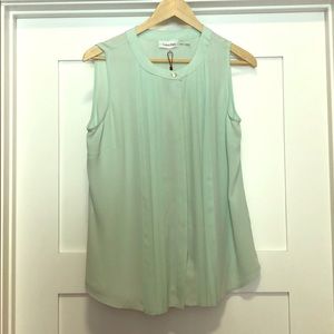 Calvin Klein sleeveless blouse.
